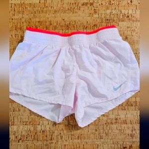 Nike light pink running shorts size small